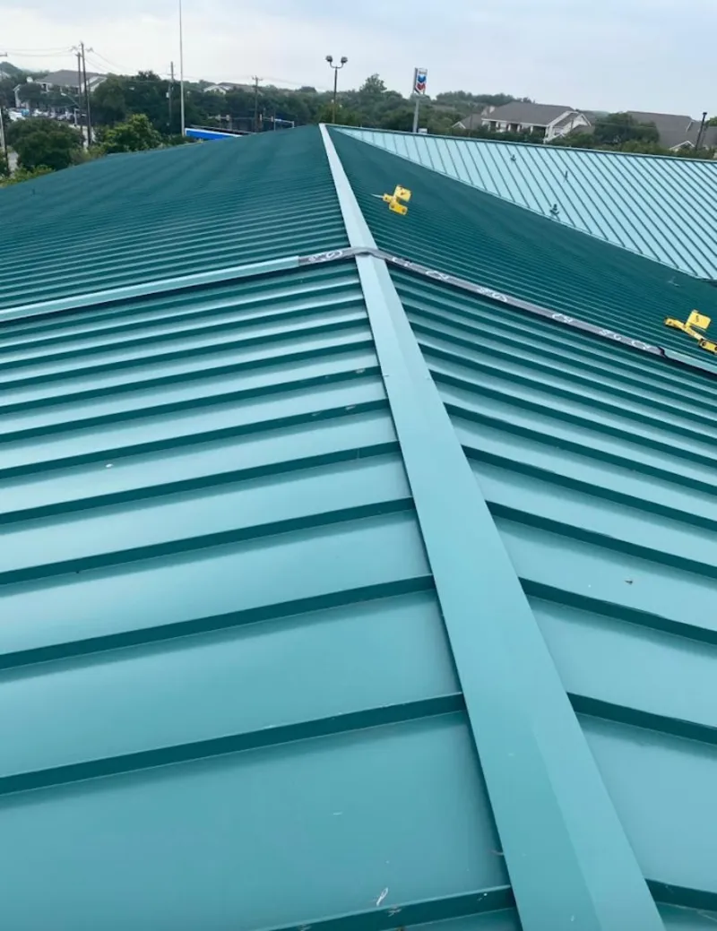 Green commercial metal roof ridge and valley for Metal Roof Repair in Copperas Cove